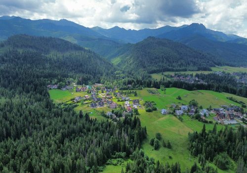 Breathtaking aerial photo of a picturesque valley in the Tatra Mountains, Poland, during summer.